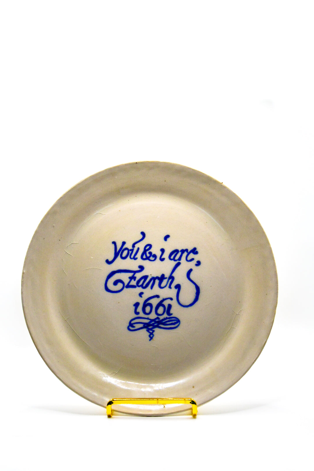 White ceramic plate with blue text on a white background