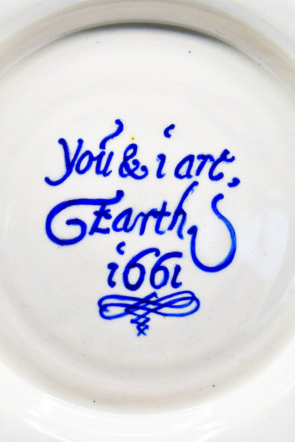 Ceramic plate with text on a white background
