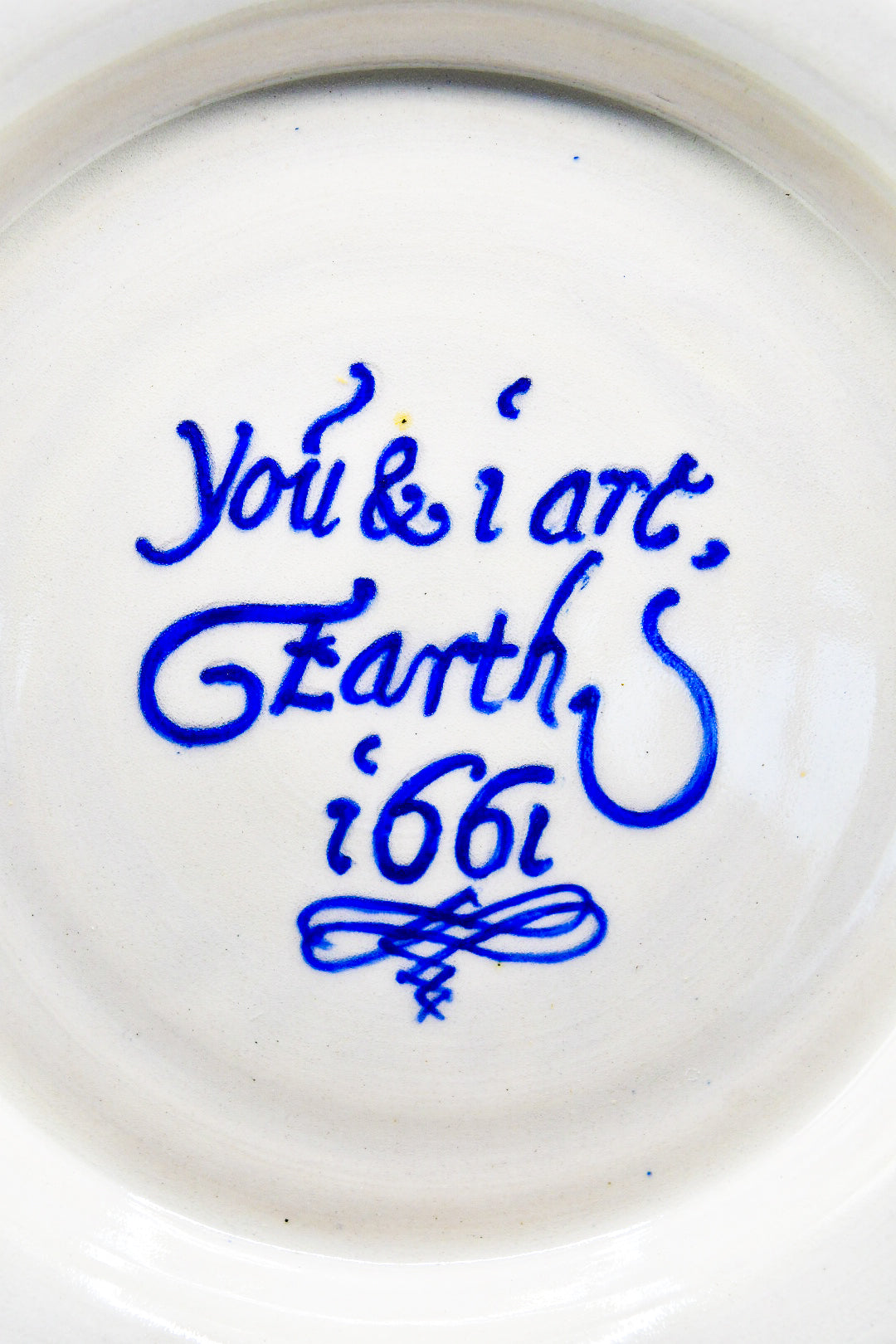 Ceramic plate with text on a white background