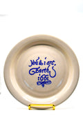 Ceramic plate with text on a white background
