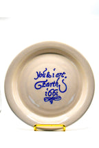 Ceramic plate with text on a white background