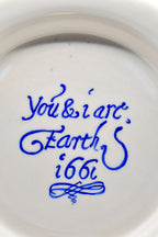 Ceramic plate with text on a white background