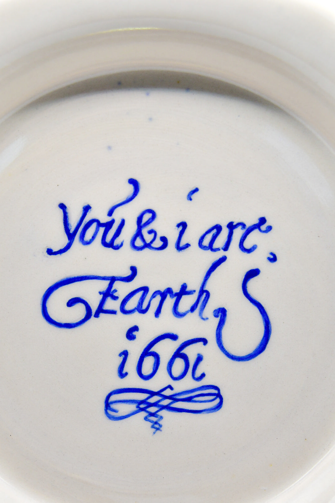 Ceramic plate with text on a white background