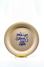 Ceramic plate with text on a white background