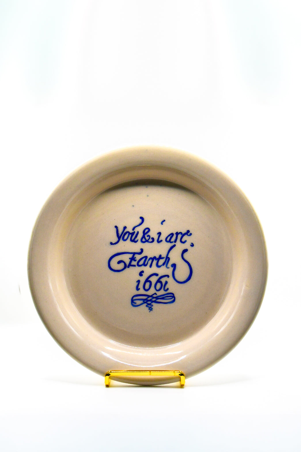 Ceramic plate with text on a white background