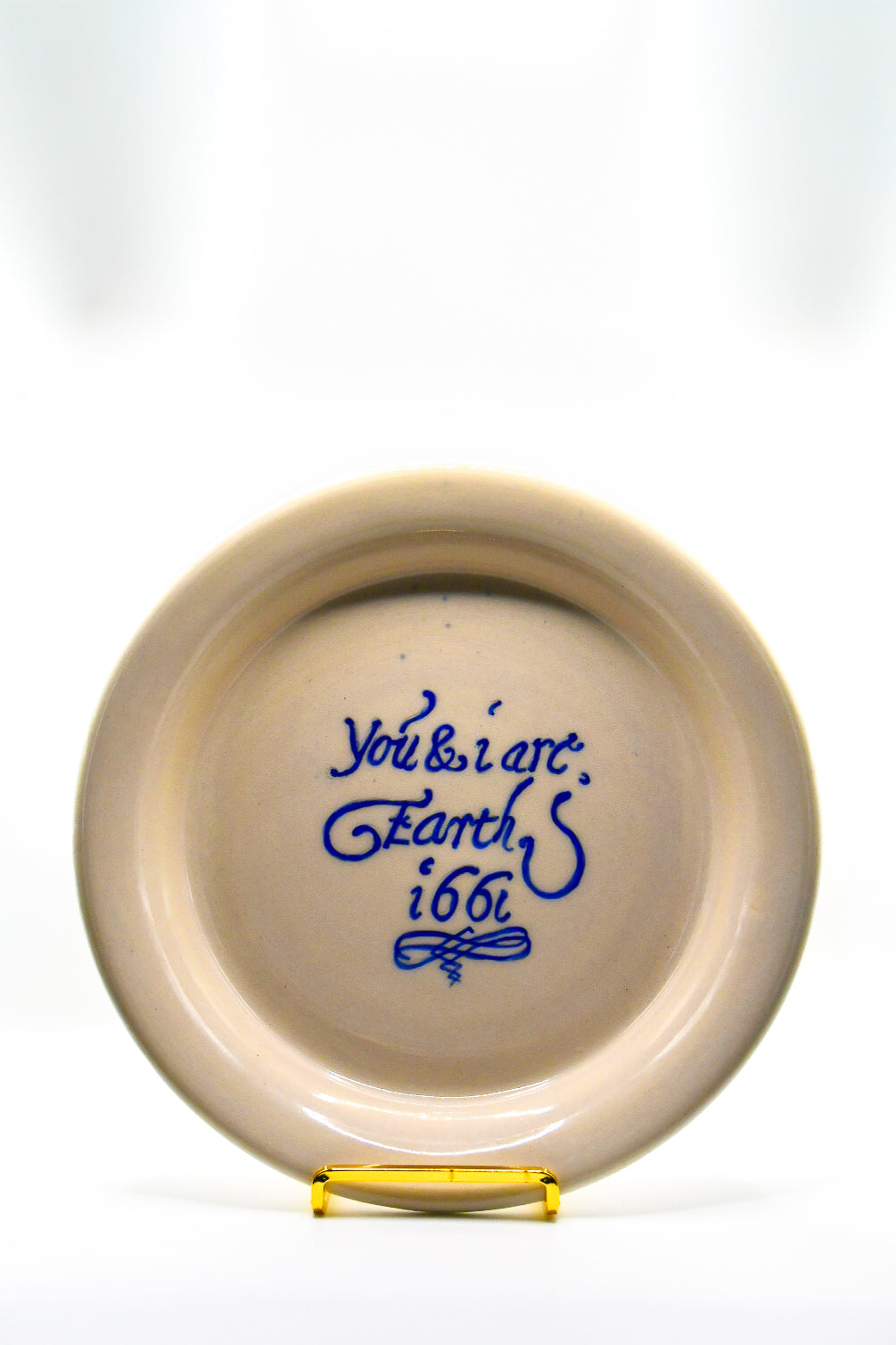 Ceramic plate with text on a white background